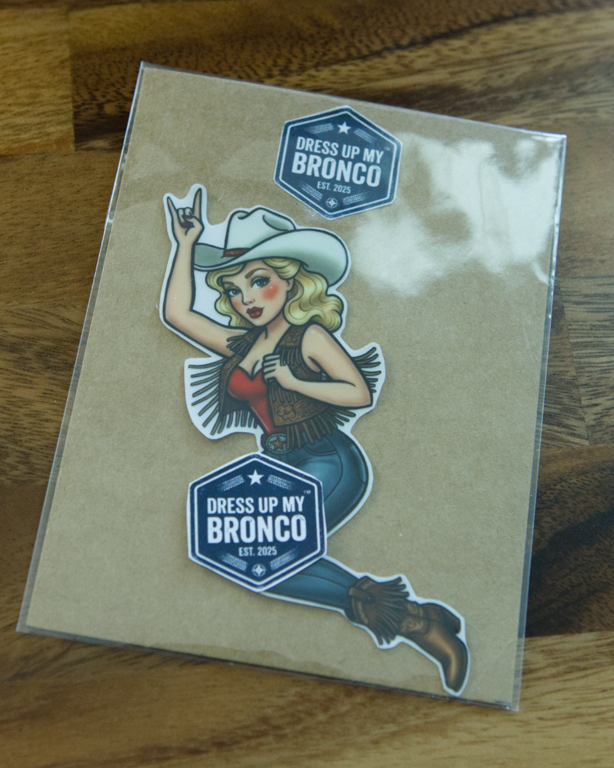 Golden Cowgirl Bronco Bombshell — Bucking Emblem Vinyl Decal (Pin-Up Edition)