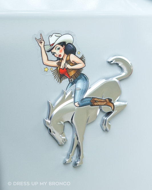 Brunette Cowgirl Bronco Bombshell — Bucking Emblem Vinyl Decal (Pin-Up Edition)