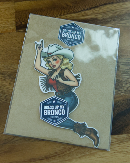 Golden Cowgirl Bronco Bombshell — Bucking Emblem Vinyl Decal (Pin-Up Edition)